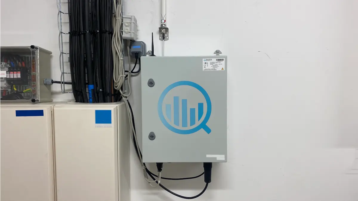 A connected electrical submeter linked to a factory's main low-voltage switchboard